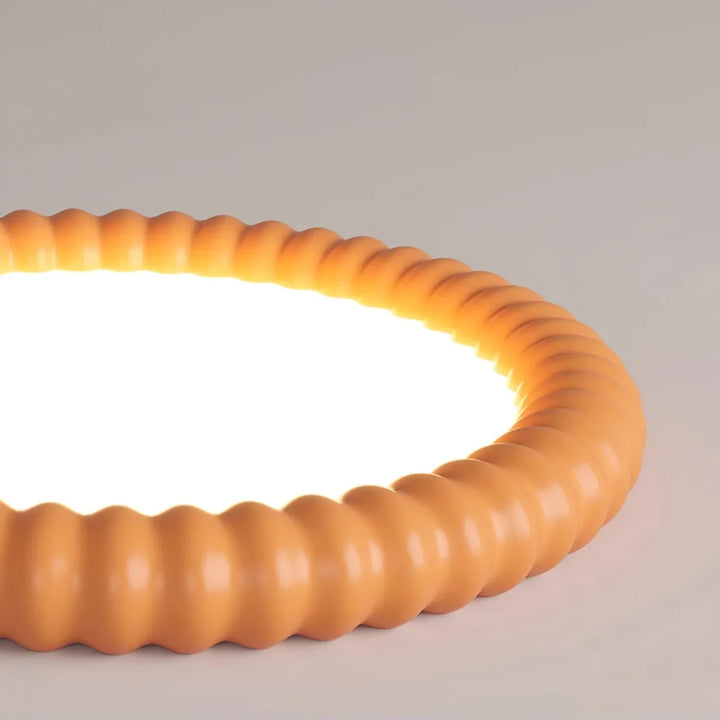 Moderne LED-Deckenleuchte mit dekorativem Wellenrahmen