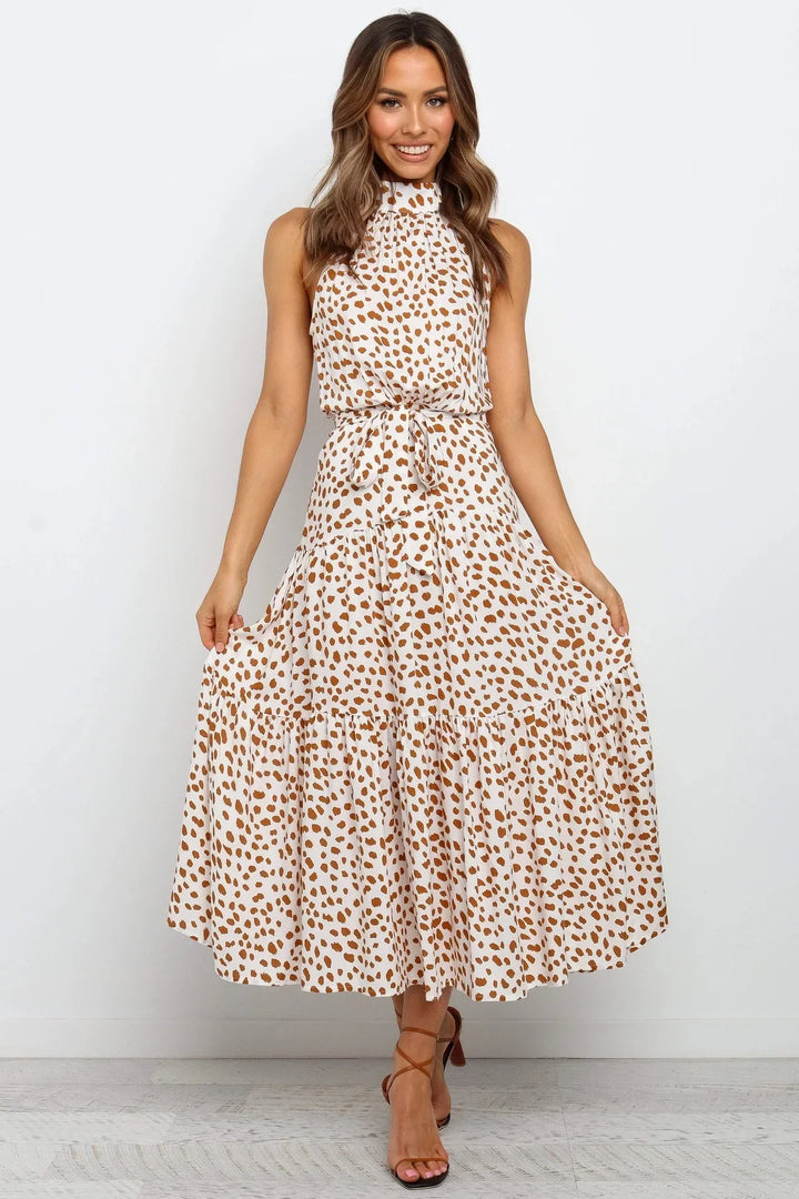 Elegantes Midikleid mit Erbsendruck und Krawatte im Nacken