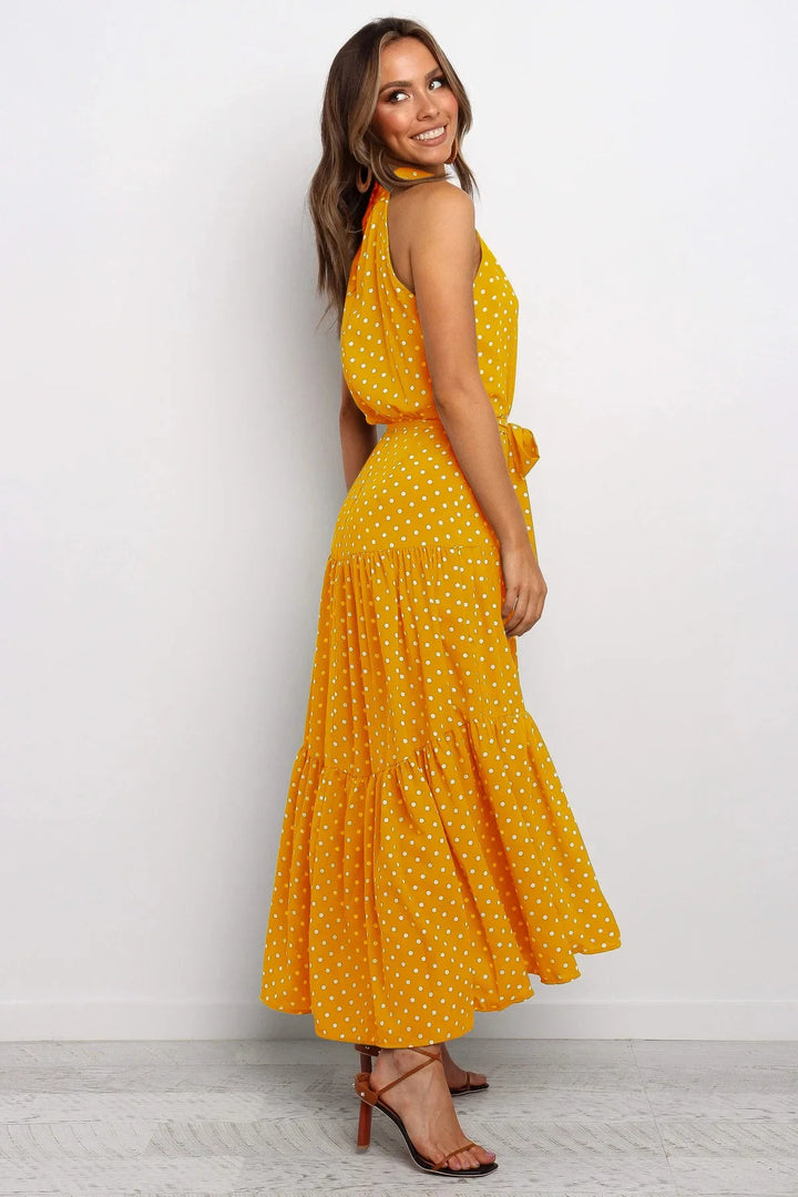 Elegantes Midikleid mit Erbsendruck und Krawatte im Nacken