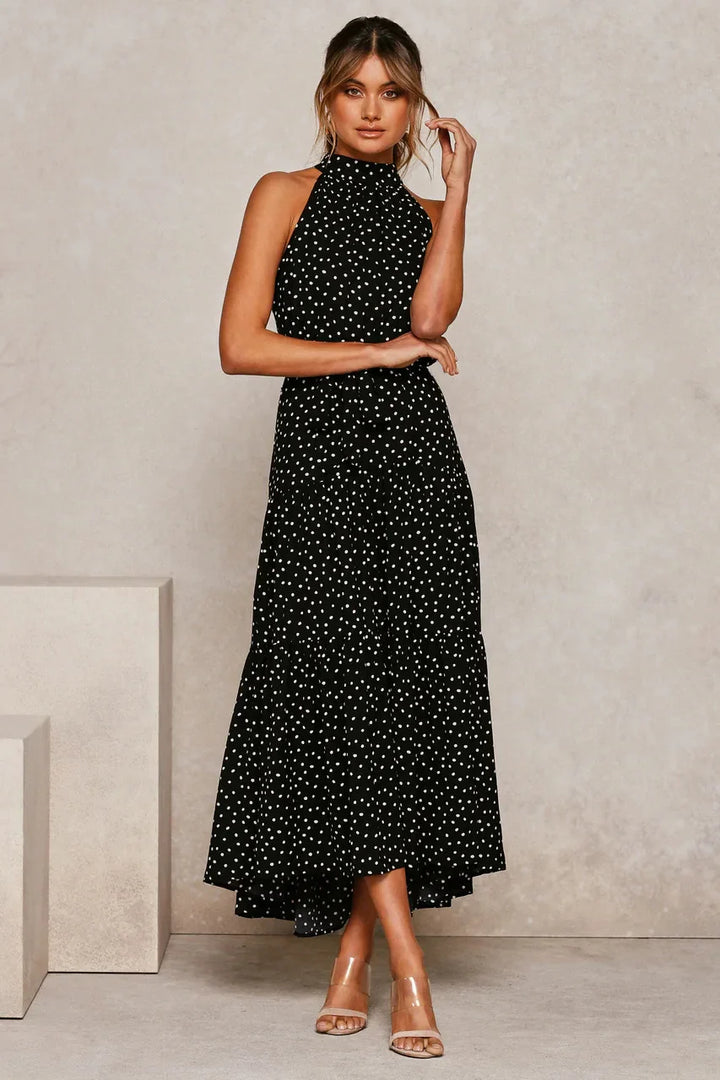 Elegantes Midikleid mit Erbsendruck und Krawatte im Nacken