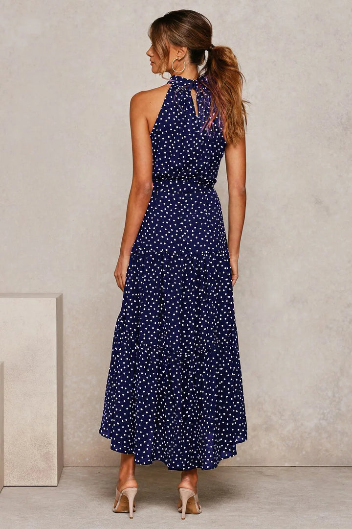 Elegantes Midikleid mit Erbsendruck und Krawatte im Nacken