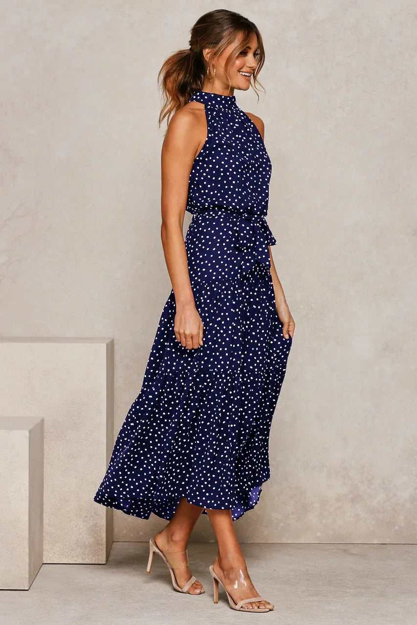 Elegantes Midikleid mit Erbsendruck und Krawatte im Nacken