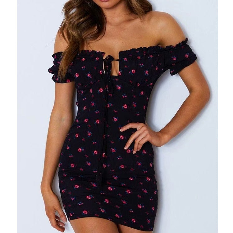Minikleid mit Blumendruck, offener Schulterpartie und Bändern