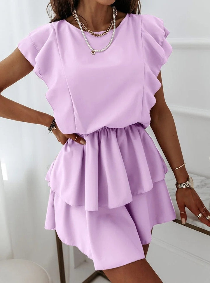 Kleid mit Rüschen und Puffärmeln