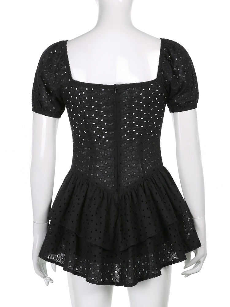 Flusskleid mit überschnittenen Schultern