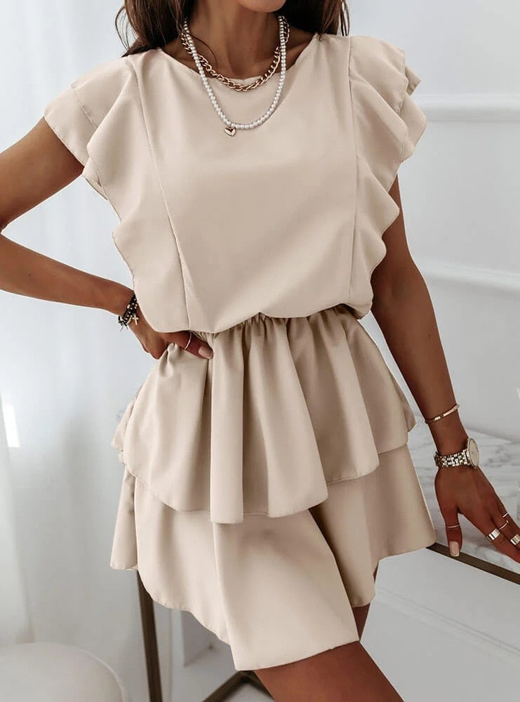 Kleid mit Rüschen und Puffärmeln
