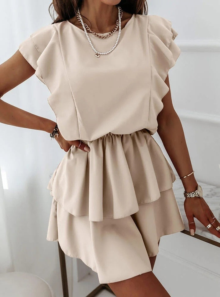 Kleid mit Rüschen und Puffärmeln