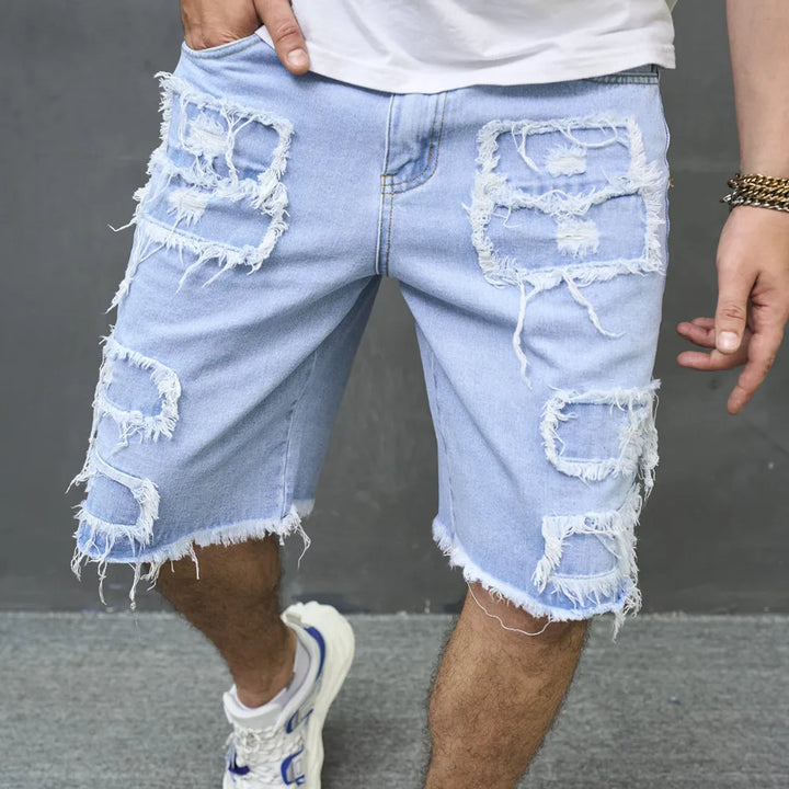 Kurze Denim-Shorts für Männer mit auffälligen Fransen