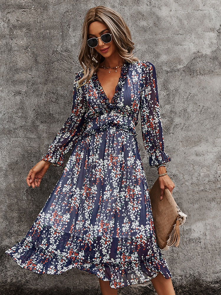 Luftiges Midikleid mit V-Ausschnitt und dezentem Blumenmuster