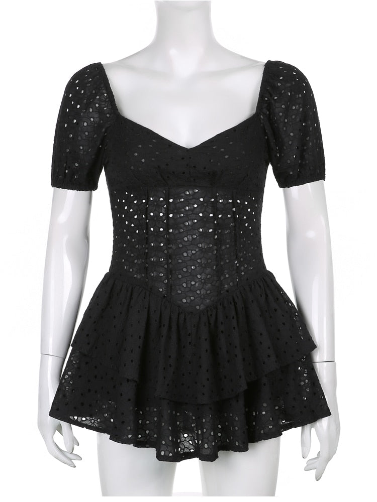 Flusskleid mit überschnittenen Schultern