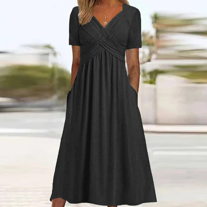 Elegantes Midikleid mit kurzen Ärmeln und Taschen