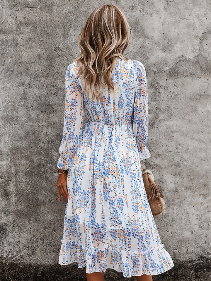 Luftiges Midikleid mit V-Ausschnitt und dezentem Blumenmuster