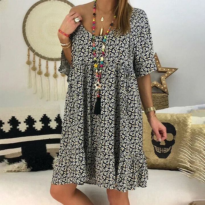 Luftiges Kleid mit floralem Muster und Rüsche
