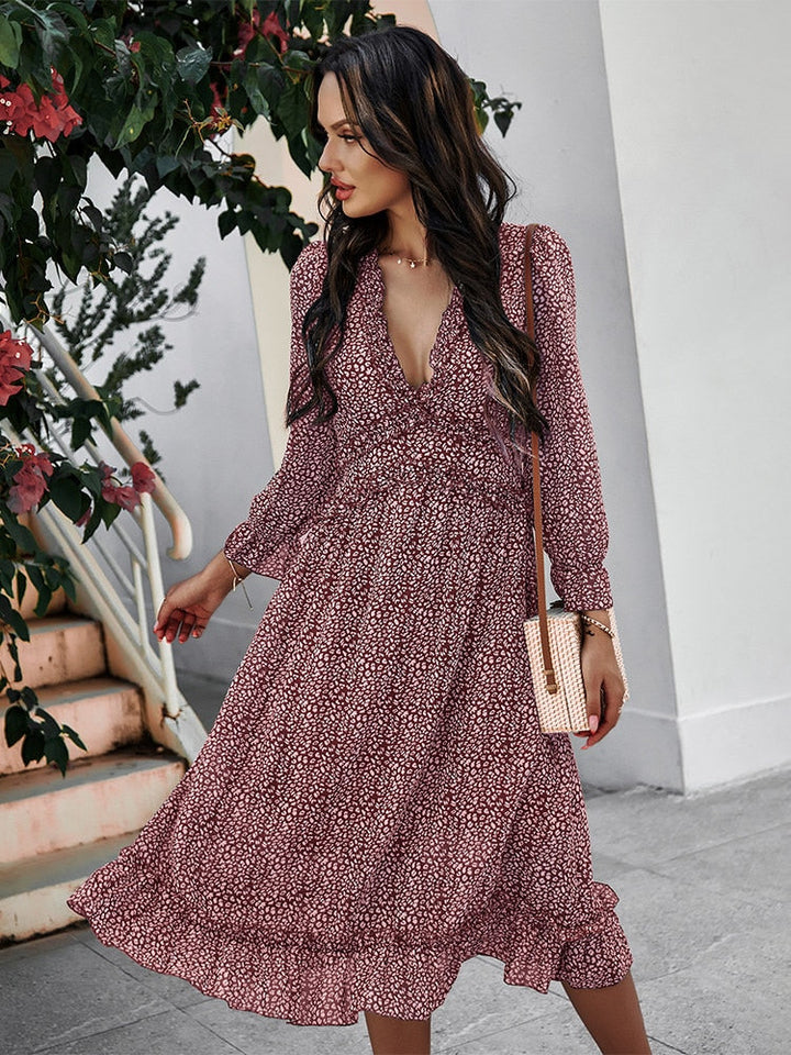 Luftiges Midikleid mit V-Ausschnitt und dezentem Blumenmuster