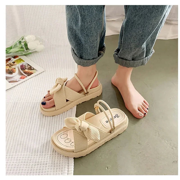 Damen-Sandalen mit Schleife und dekorativer Sohle