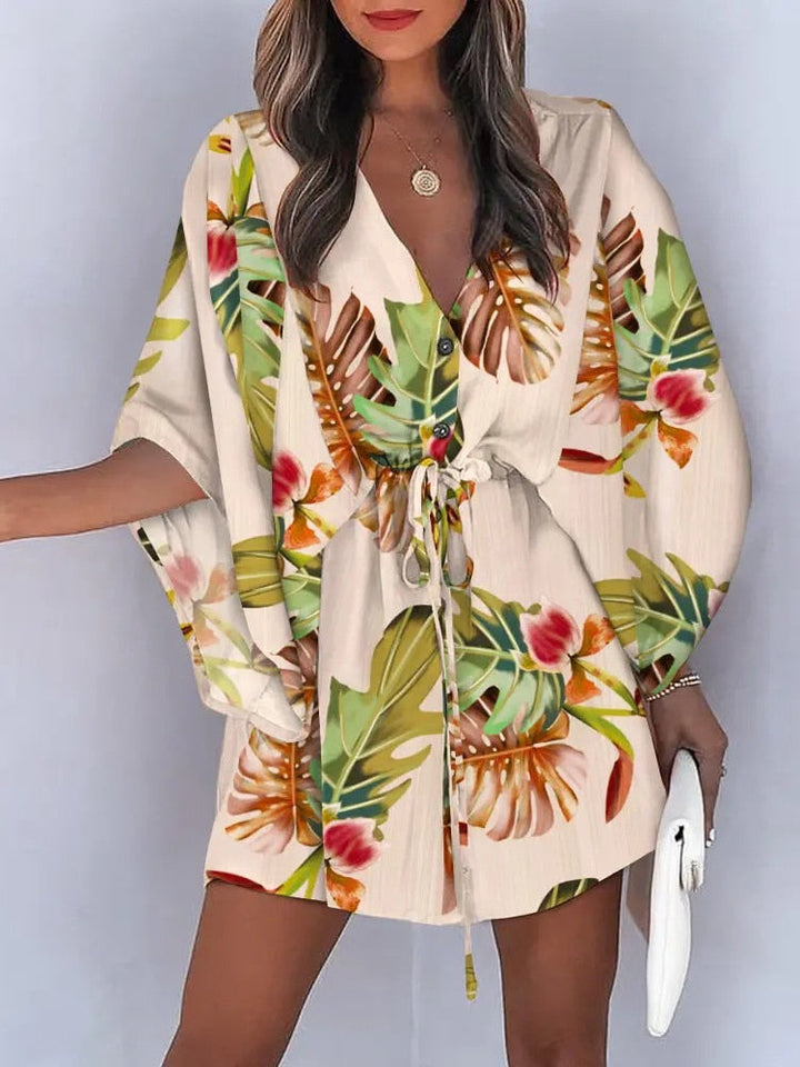 Botanisch gemustertes Kleid mit weiten Ärmeln