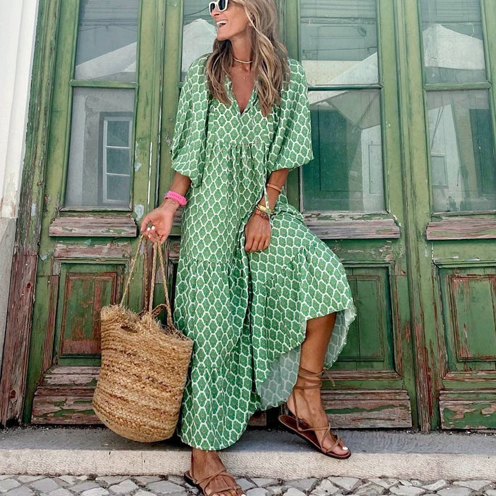 Asymmetrisches Kleid mit V-Ausschnitt in geometrischem Muster