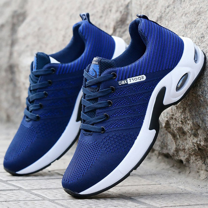 Sportliche Herrensneaker mit dynamischem Design und atmungsaktivem Mesh