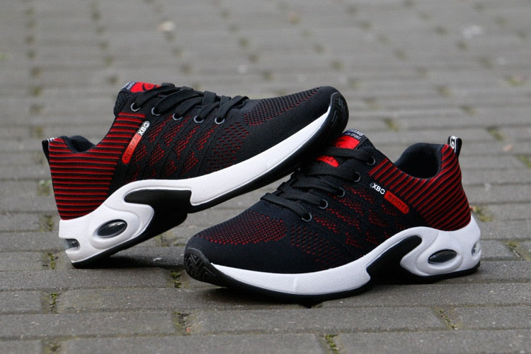 Sportliche Herrensneaker mit dynamischem Design und atmungsaktivem Mesh