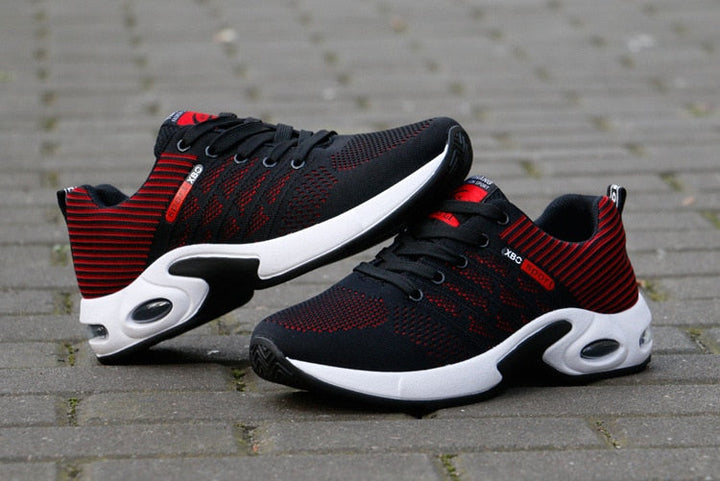 Sportliche Herrensneaker mit dynamischem Design und atmungsaktivem Mesh