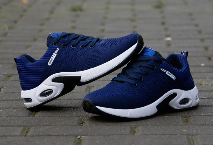Sportliche Herrensneaker mit dynamischem Design und atmungsaktivem Mesh
