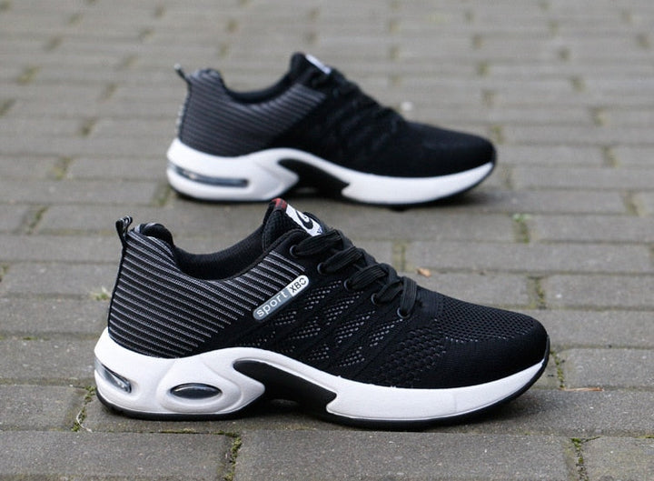 Sportliche Herrensneaker mit dynamischem Design und atmungsaktivem Mesh
