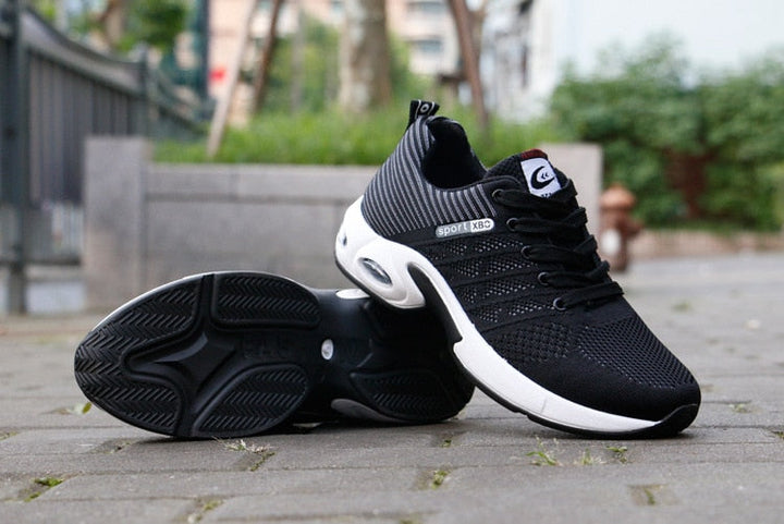 Sportliche Herrensneaker mit dynamischem Design und atmungsaktivem Mesh