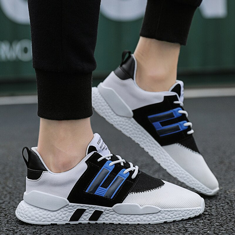 Sportliche Herrenschuhe mit atmungsaktivem Mesh und dämpfender Sohle