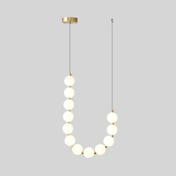 Moderne LED-Pendelleuchte – ausdrucksstarke Kugelkette aus Lichtbällen